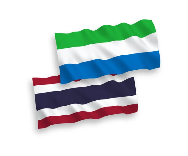 Banderas de Sierra Leona y Tailandia sobre fondo blanco — Archivo Imágenes Vectoriales