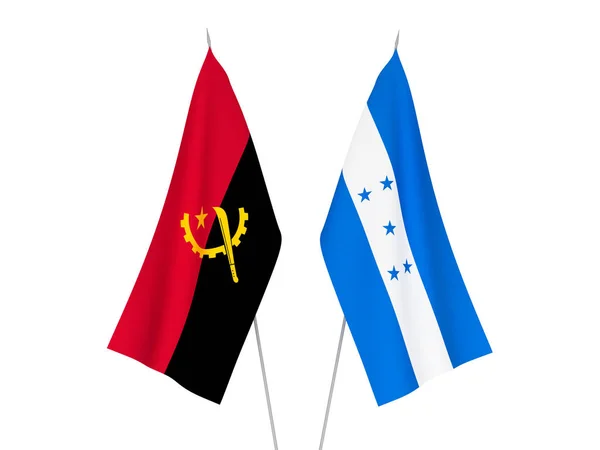 Honduras and Angola flags — 스톡 사진