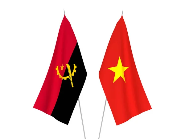 Флаги Вьетнама и Анголы — стоковое фото