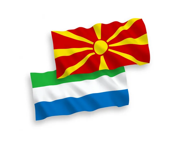 Banderas de Sierra Leona y Macedonia del Norte sobre fondo blanco — Archivo Imágenes Vectoriales