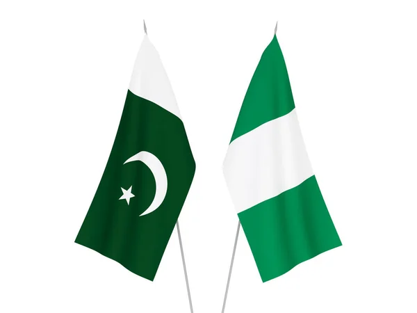 Nigeria and Pakistan flags — Stok fotoğraf