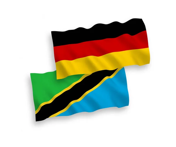 Flaggor i Tanzania och Tyskland på en vit bakgrund — Stock vektor