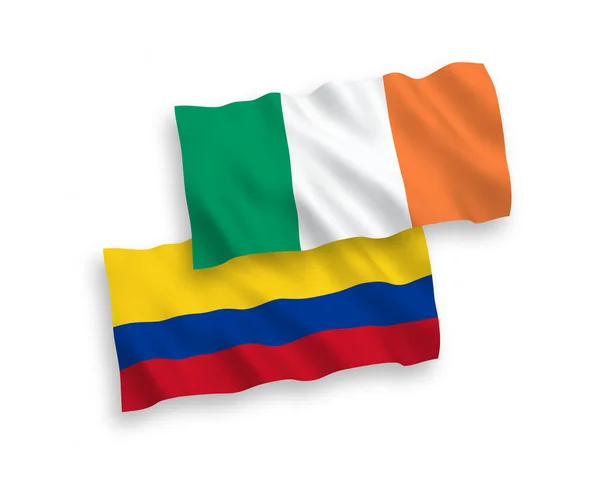Vlajky Irska a Kolumbie na bílém pozadí — Stockový vektor