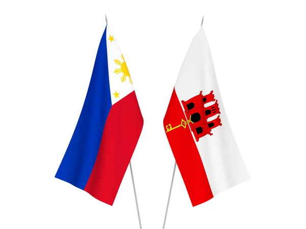 Gibraltar und philippinische Flaggen — Stockfoto