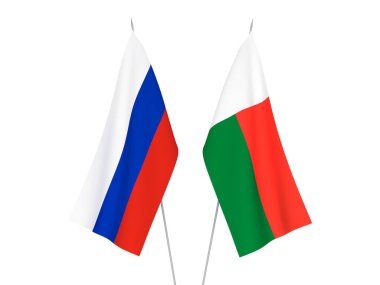 Beyaz arka planda Rusya ve Madagaskar 'ın ulusal kumaş bayrakları izole edildi. 3d resimleme.