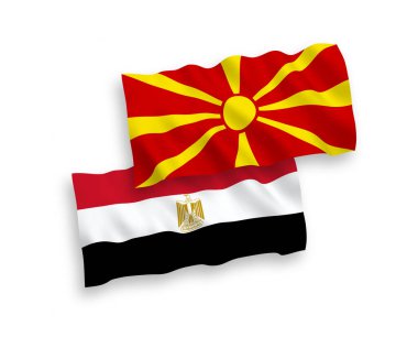 Mısır ve Kuzey Makedonya 'nın ulusal taşıyıcı kumaş bayrakları beyaz zemin üzerinde izole edildi. 1 'e 2 oranında.