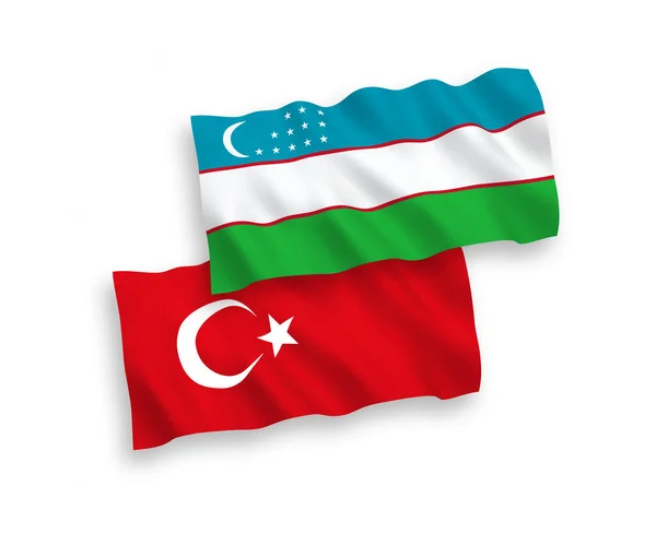 Beyaz Zemin Üzerinde Türkiye Özbekistan Ulusal Taşıyıcı Kumaş Bayrakları Izole — Stok Vektör