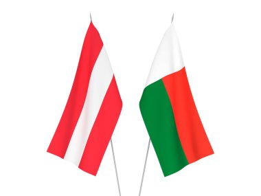 Madagaskar ve Avusturya 'nın ulusal kumaş bayrakları beyaz arka planda izole edildi. 3d resimleme.