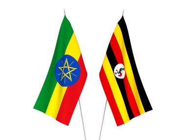 Beyaz arka planda Etiyopya ve Uganda 'nın ulusal kumaş bayrakları izole edildi. 3d resimleme.