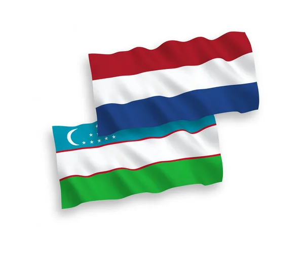 우즈베키스탄 네덜란드의 국기들은 바탕에 게양되었다 — 스톡 벡터
