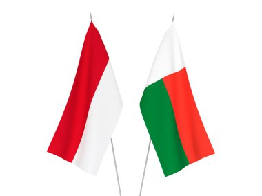 Madagaskar ve Endonezya 'nın ulusal kumaş bayrakları beyaz arka planda izole edildi. 3d resimleme.