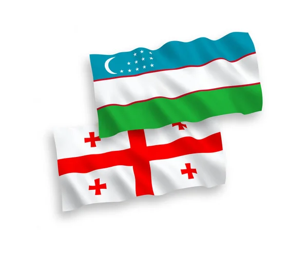 Drapeaux de l'Ouzbékistan et de la Géorgie sur fond blanc — Image vectorielle