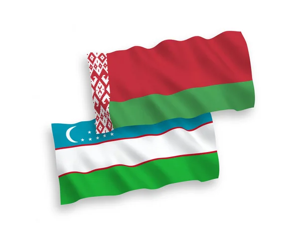 Banderas de Uzbekistán y Bielorrusia sobre fondo blanco — Archivo Imágenes Vectoriales