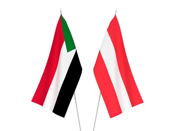 Белом Фоне Выделены Национальные Тканевые Флаги Судана Австрии Трехмерная Иллюстрация — стоковое фото