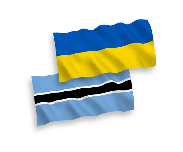 博茨瓦纳和乌克兰的国家病媒织物波条旗在白色背景下隔离 1比2的比例 — 图库矢量图片