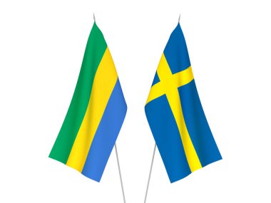 İsveç ve Gabon 'un ulusal kumaş bayrakları beyaz arka planda izole edildi. 3d resimleme.