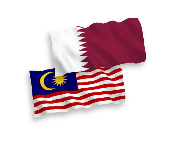 Flags of Qatar and Malaysia on a white background — Stock Vector