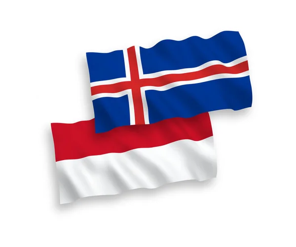 하얀 배경에 있는 인도네시아와 아이슬란드의 깃발 — 스톡 벡터