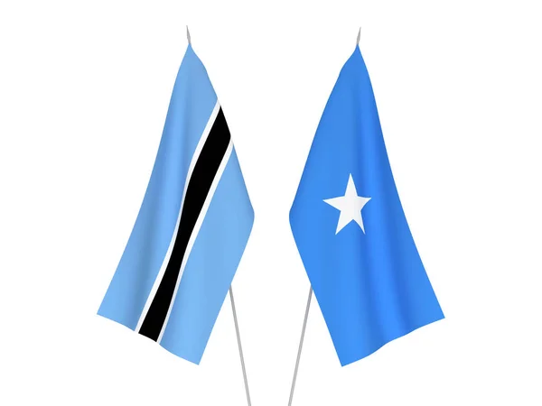 Εθνικές Σημαίες Υφάσματος Της Σομαλίας Και Της Μποτσουάνα Απομονωμένες Λευκό — Φωτογραφία Αρχείου