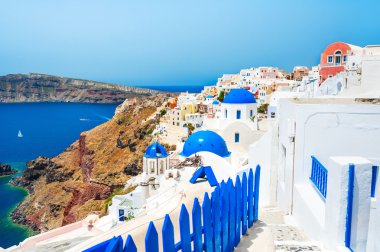 Panoramic view of Oia town in Santorini island, Greece.  clipart