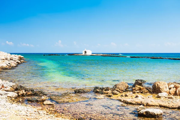 Beautiful beach and white chapel in the sea — Stock Photo, Image