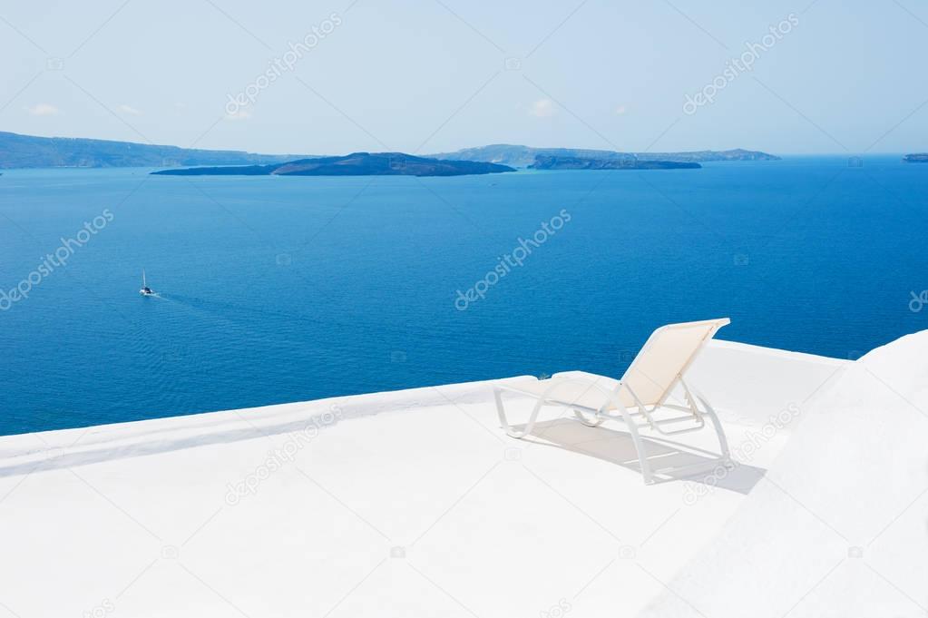 Chaise lounge on the terrace with sea view. 