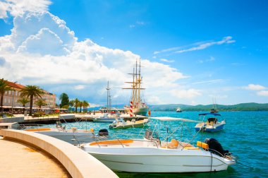 Beautiful sea promenade in Tivat, Montenegro. Sea port with yachts. Kotor bay, Adriatic sea. Famous travel destination. clipart