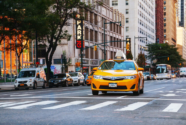 Yellow cab at the street of Manhattan in the morning
