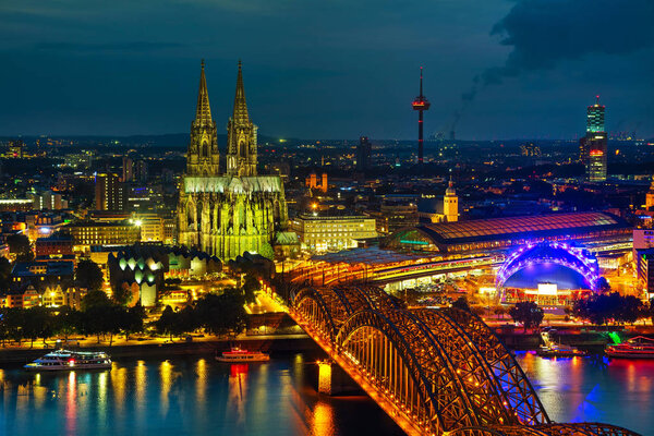 Aerial view of cityscape in Cologne after sunset