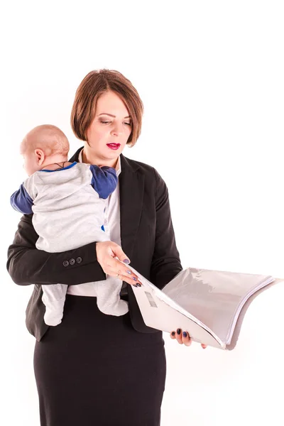 Young working mom carrying her baby in one hand isolated — Stock Photo, Image