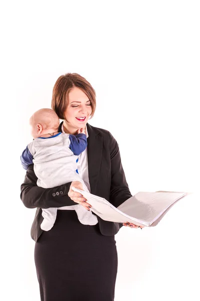 Young working mom carrying her baby in one hand isolated — Stock Photo, Image