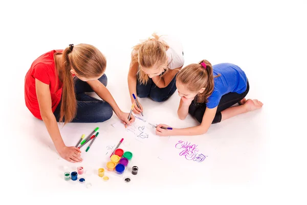 Happy kids drawing isolated on white — Stock Photo, Image