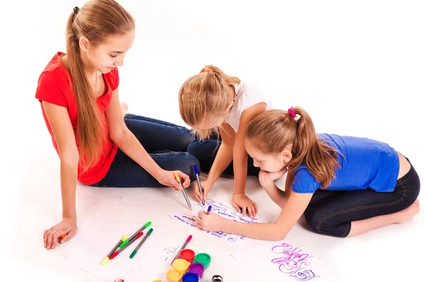 Happy kids drawing isolated on white — Stock Photo, Image