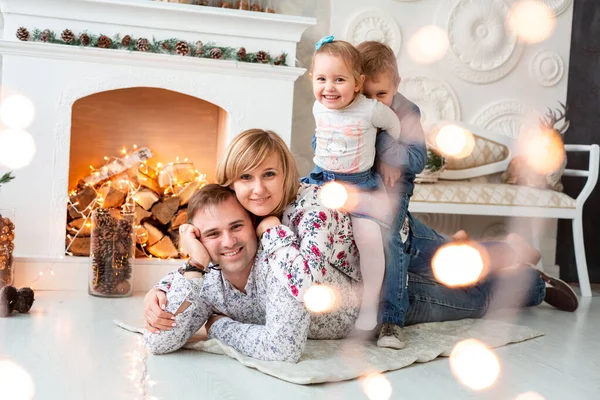 Happy family having fun together at Christmas eve — Stock Photo, Image