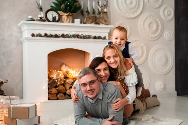 Happy family having fun together at Christmas eve — Stock Photo, Image