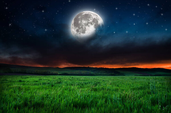 View on dark blue night sky background. Elements of this image furnished by NASA
