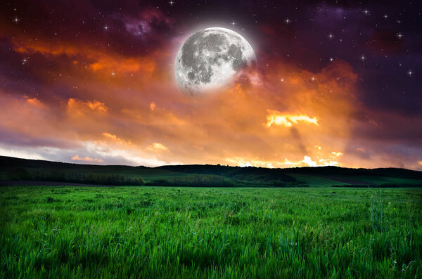 View on dark yellow night sky background. Elements of this image furnished by NASA