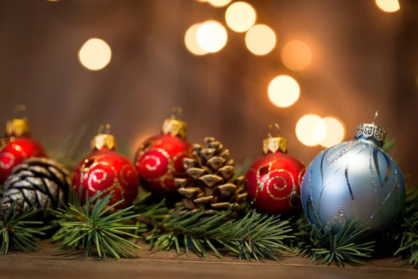 Red Christmas balls with pine branches — Stock Photo, Image