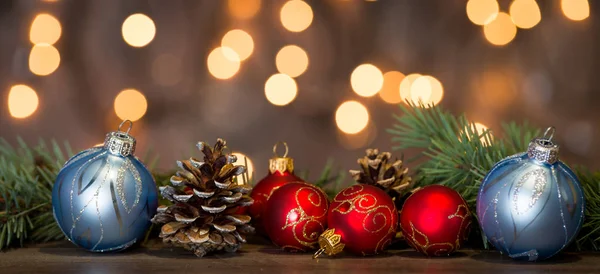 Christmas decorations on wooden board — Stock Photo, Image