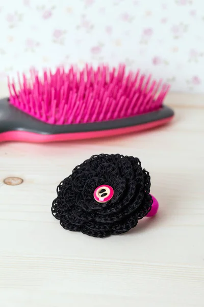 Glamour black scrunchy with hand made crochet flowers — Stock Photo, Image