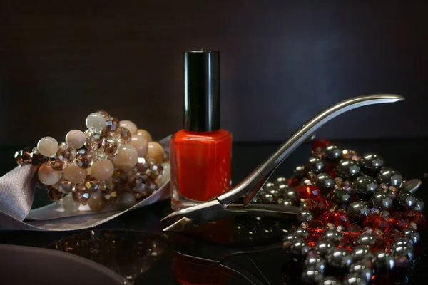 Manicure tool and  nail polish on black  background — Stock Photo, Image