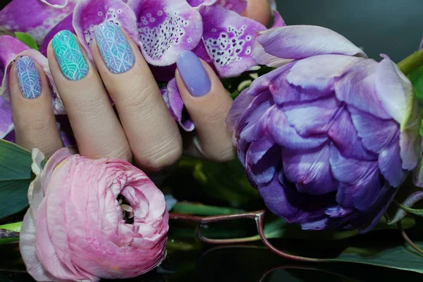 Beautiful Nail Art Manicure with flowers.Nail Care.