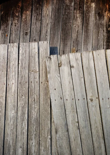 Clouse up photo of gray weathered boards — ストック写真