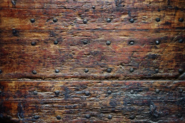 Getextureerde houten ondergrond. Antieke planken met vintage nagels. Foto naar boven. — Stockfoto