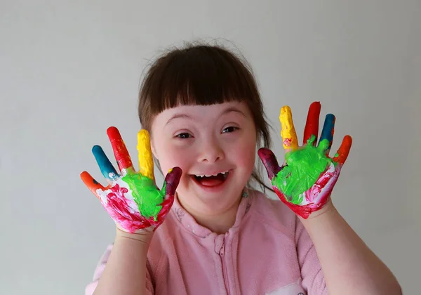 Cute little girl with painted hands — Stock Photo, Image