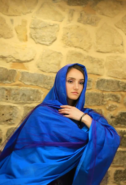 Beautiful girl in blue shawl — Stock Photo, Image