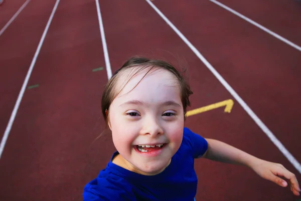 Little girl have fun on the stadium — Stock Photo, Image