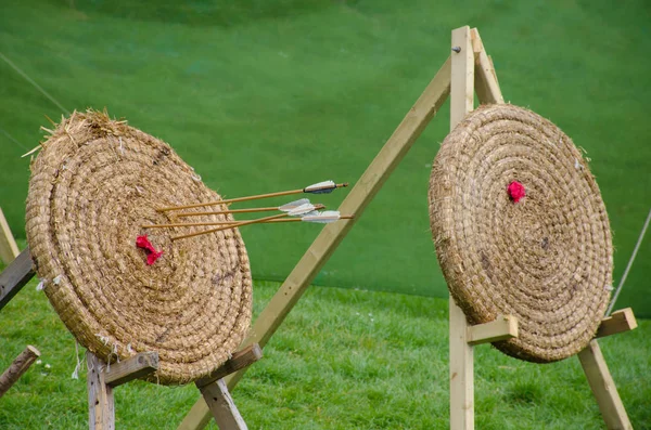 Straw Archery target with arrows — Stock Photo, Image