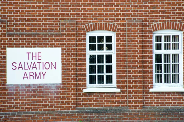 Salvation Army sign with red  brickwork
