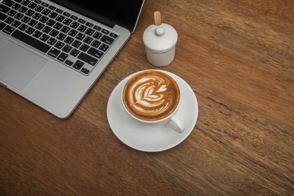 Coffee and notebook on the wood — Stock Photo, Image